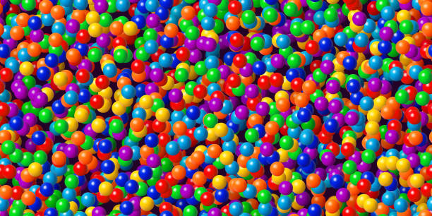 istock Rainbow colors abstract bg with plastic balls in a childrens dry pool for games as a seamless pattern 2156113796
