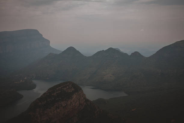 A stunning aerial view of Blyde River Canyon from God's Window in South Africa showcasing dramatic cliffs and lush greenery ideal for nature documentaries and travel enthusiasts