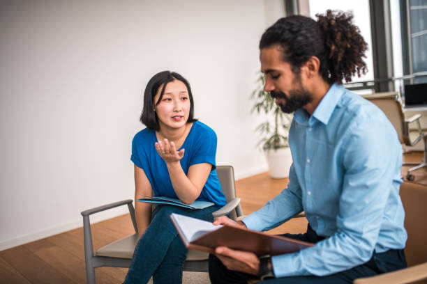 istock Good Looking Mid Adult Colleagues in Disagreement 2156116340