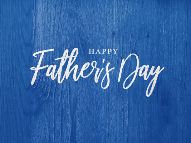 felice festa del papà bianco calligrafia script su legno blu - festa del papà foto e immagini stock