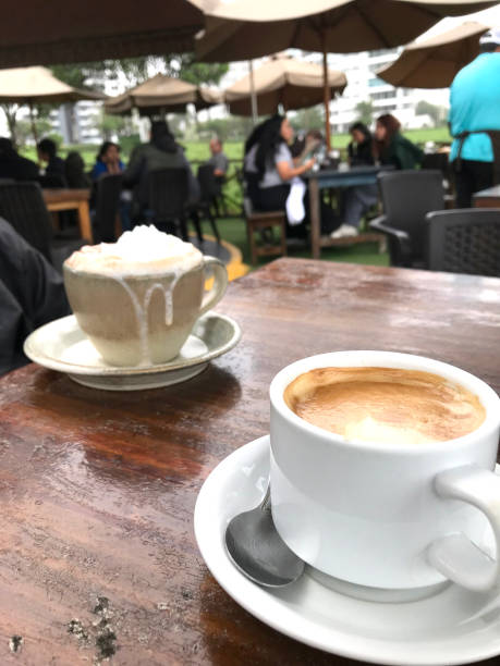 istock Outdoor cafe ambiance with coffee cups 2156125015