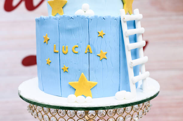 istock Customized blue birthday cake with name and stars 2156125650