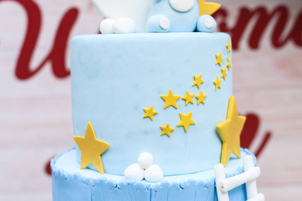 istock Blue and yellow star themed cake 2156125664