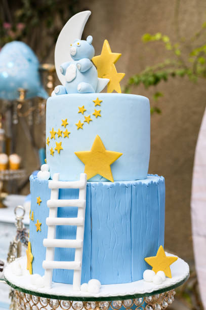 istock Whimsical moon and stars baby shower cake 2156125694