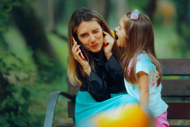 Child Yelling While Mom Tries to Speak on the Phone