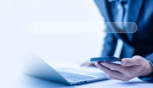 istock businessman search bar from a smartphone 2156131691