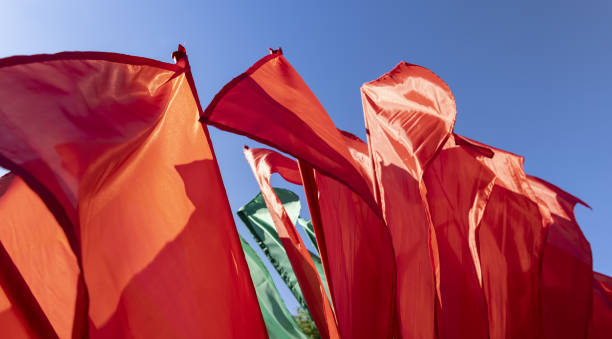 istock red flags set up during the celebration in windy weather 2156136081