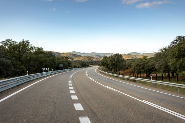istock Curvy road to nowhere, an escape into the unknown 2156140297