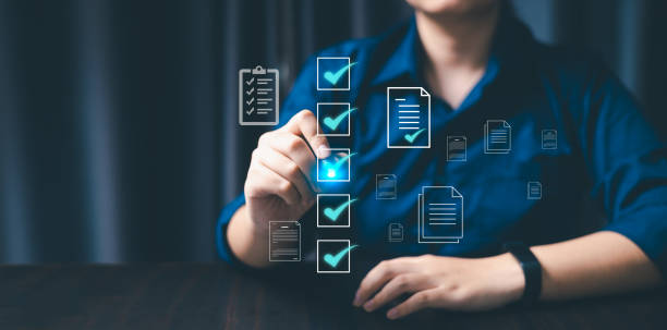 istock Online document management has become essential for corporate offices, In the digital age, person uses computer technology to streamline business operations. document, online, technology, management. 2156140532