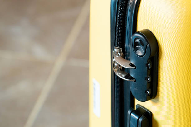 istock Number combination padlock on travel suitcase 2156151305
