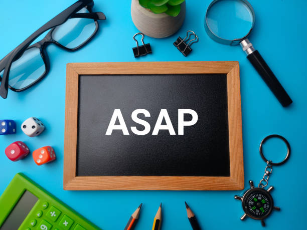 istock Top view wooden board with the word ASAP As Soon As Possible 2156153476