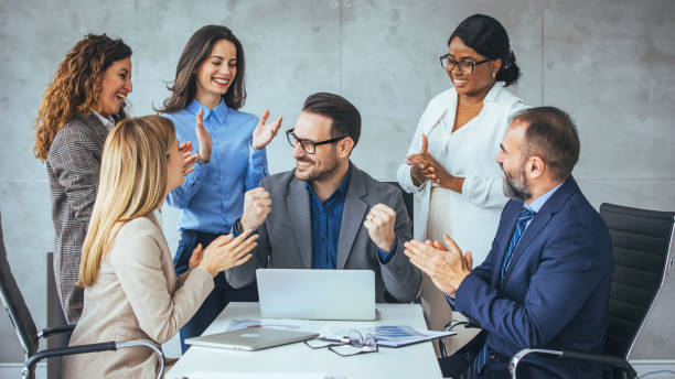 istock Multicultural Team Applauding Successful Businessman 2156153878
