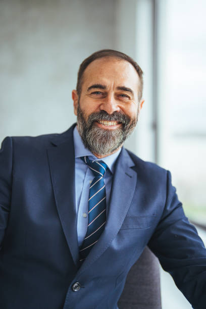 istock Professional Senior Businessman in Modern Office Setting 2156153951