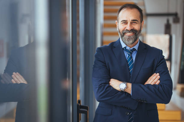 istock Confident Mature Businessman in Corporate Setting 2156153981