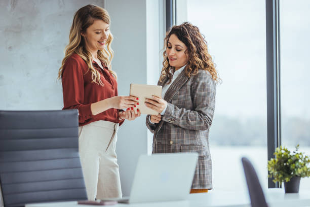 istock Diverse Businesswomen Collaborating in Office 2156154032