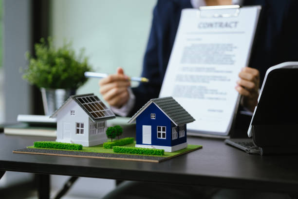 istock Real estate broker agent presenting and consult to customer to decision making 2156156855