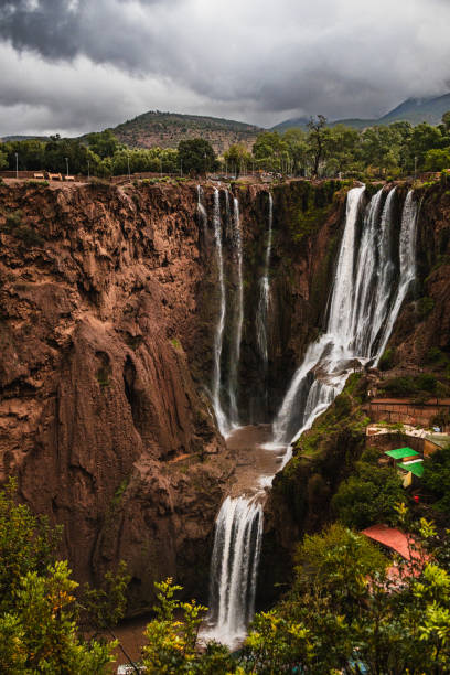 Full view of the Ouzoud Waterfalls (Morocco). Picture in a stormy day with a lot of water in the waterfalls, from one of the viewpoints.