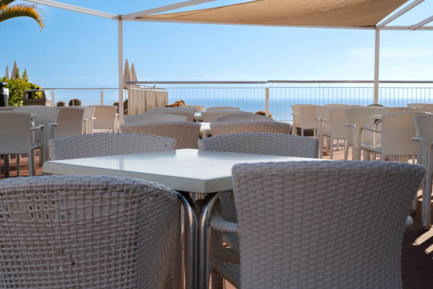 istock A beachside restaurant with a view of the ocean. 2156160023