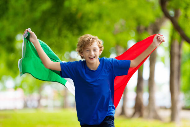istock Child running with Italy flag. Italian fan. 2156160749