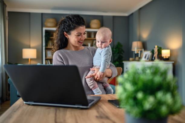 istock Mother and baby working together. 2156160963