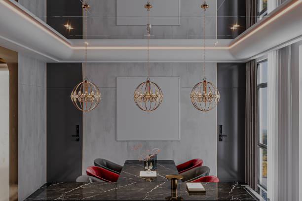 istock A luxurious dining room with a marble dining table with red seating chairs and elegant lighting. 2156162348