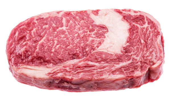 istock Raw ribeye steak on white background. File contains clipping path.. 2156162694