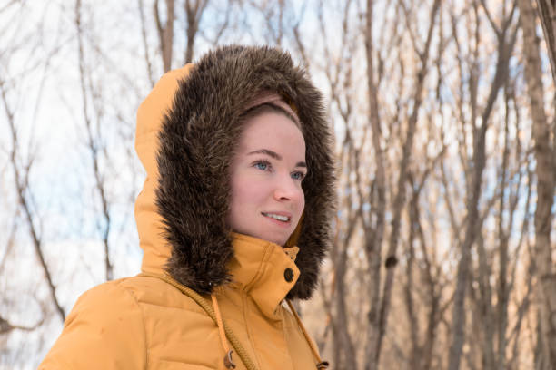istock Woman in warm clothes outdoors in winter 2156164170