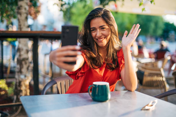 istock young woman enjoy in cafe, sunny day 2156164398