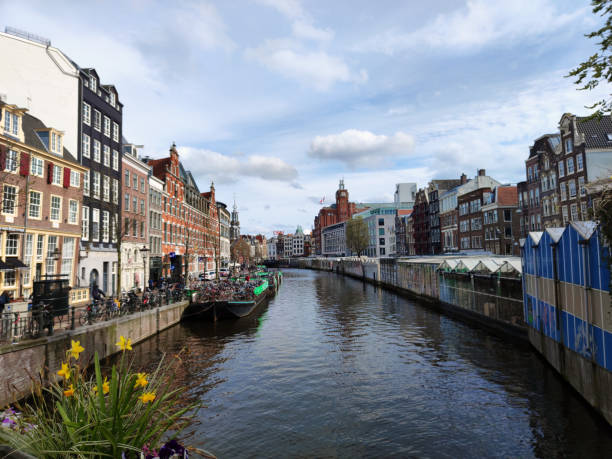 istock Amsterdam in bright day with clouds, Netherlands 2156167544