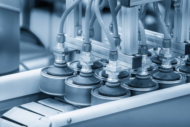 istock The high technology material handling process in canned food production by robotic system. 2156167696