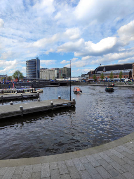 istock Amsterdam in bright day with clouds, Netherlands 2156167730
