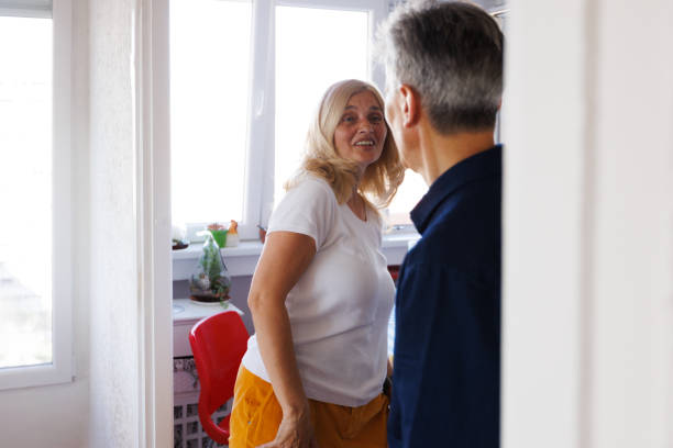 istock Caucasian 55+ Couple Dancing At Home 2156168135