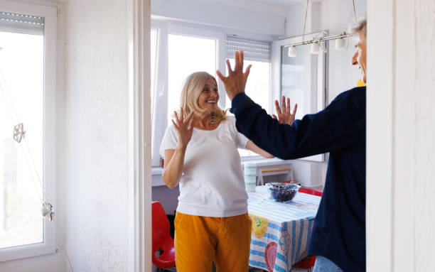 istock Caucasian 55+ Couple Dancing At Home 2156168136