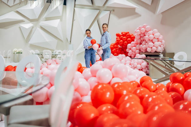 istock Party agency making party decorations with balloons 2156168366