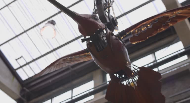Low angle view of a huge mechanical piece of Hummingbird at machines of the Isle of Nantes in France.