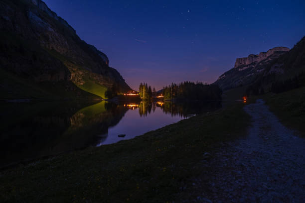istock Beautiful night at a alpine lake 2156170921