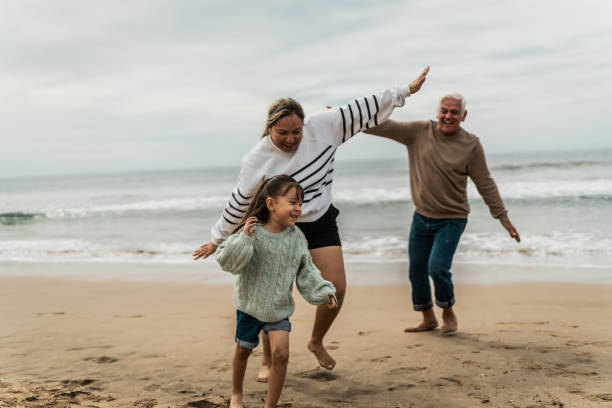 istock Family playing fly at beach 2156171287