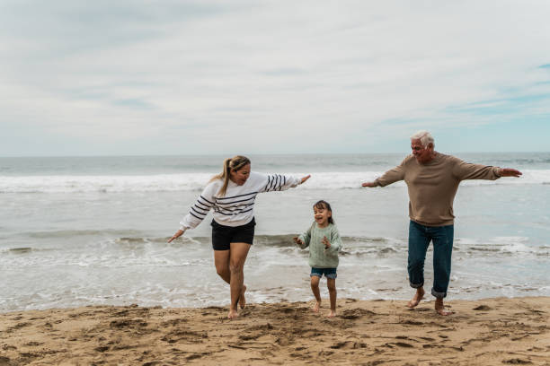 istock Family playing fly at beach 2156171307