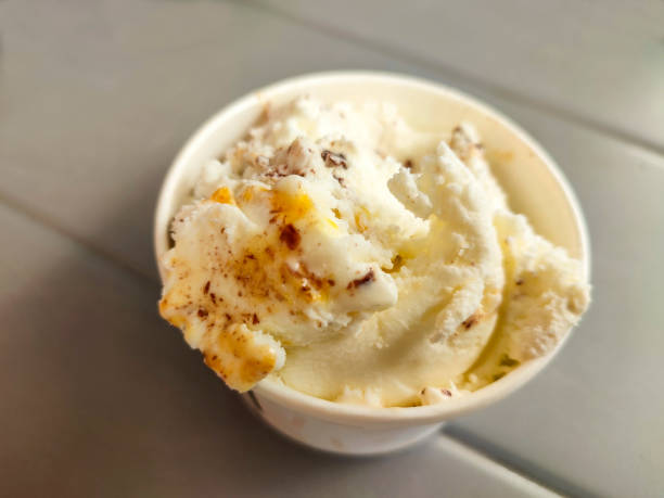 Serving sweet cold ice cream at glasgow scotland england UK
