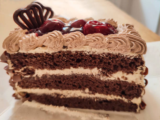 istock Birthday chocolate cake slice  at glasgow scotland england UK 2156173450