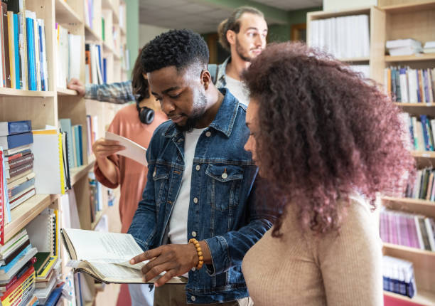 istock Students gather in the bustling college library. 2156177061