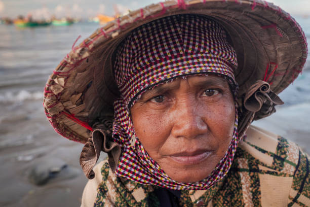 istock Vietnamese woman sorting fresh catch, Mui Ne 2156177716