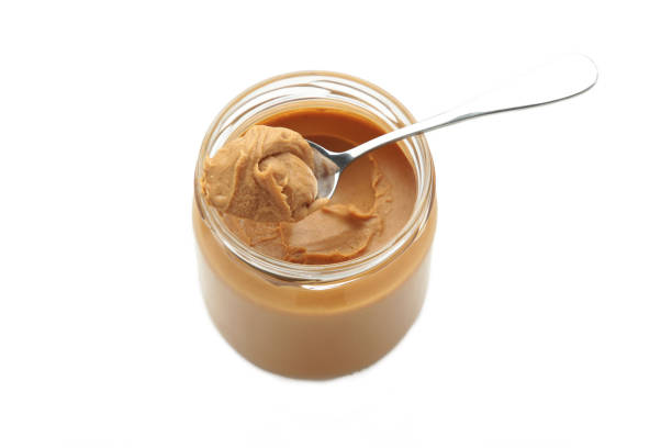 istock Jar of peanut butter isolated on white background. File contains clipping path. 2156179848