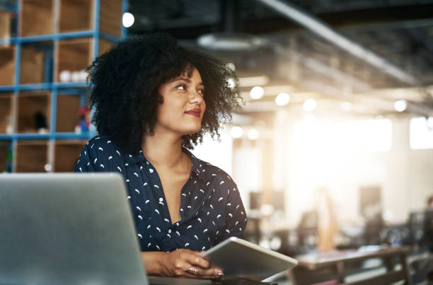 istock Thinking, laptop and business woman with tablet in office for planning, solution and project idea research. Why, brainstorming and consultant at digital agency for client, feedback or b2b networking 2156180341