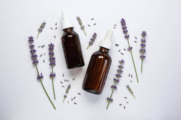 istock Flat lay composition with lavender flowers and natural cosmetic on a white background. Top view. 2156183590