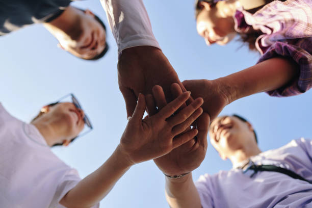 istock Uniting Hands in a Circle of Trust 2156185551