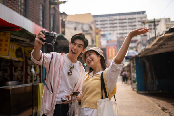 istock Asian friend using camera selfie at Petaling Street Chinatown 2156189300