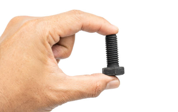 istock Black Bolt and screw on hand , Closeup isolated on a white background. 2156190924