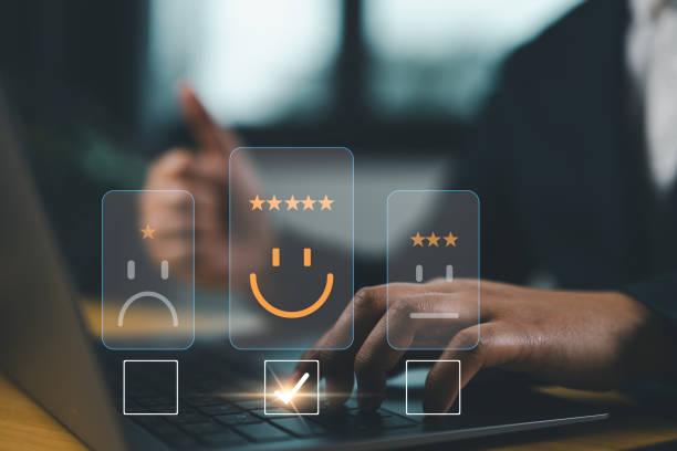 istock Customer service satisfaction survey concept.Business people or customers show satisfaction through the application on the tablet screen. By giving the most satisfaction rating and 5 stars. 2156191132