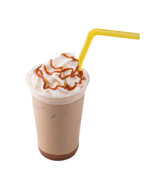 istock cold brew iced coffee with whipped cream caramel topping and dulce de leche isolated with straw top view 2156192996